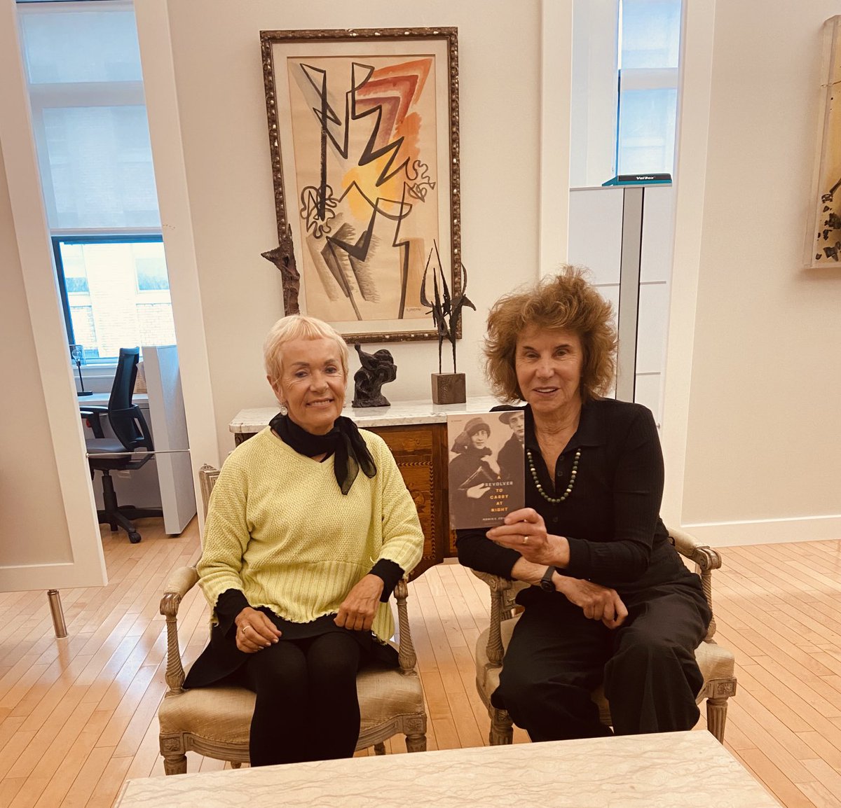 This morning in her NY office my American publisher Judith from ⁦⁦@otherpress⁩ was holding my freshly published novel, #ARevolverToCarryAtNight , about Véra and Vladimir Nabokov. In spite of my jet lag I am thrilled and deeply grateful. ⁦@G_Gutenberg⁩