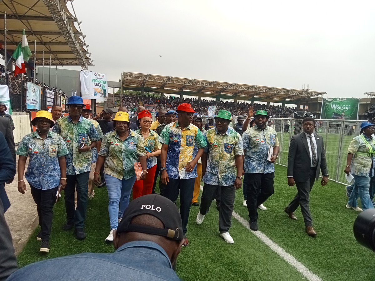 At the ongoing Workers' Day event at Onikan, Mr. Governor Babajide Sanwo-Olu receives a warm welcome amidst cheers and jubilation, showcasing the community's appreciation for his administration.