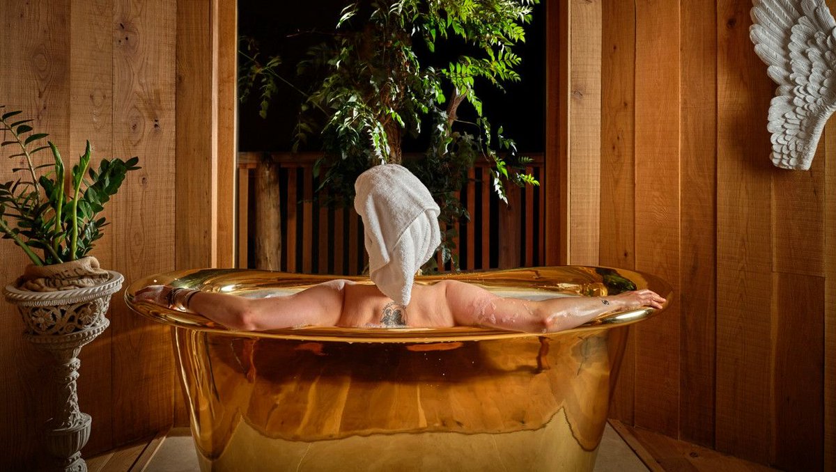 Step into a world of pure luxury as you surrender to the radiant glow of a gleaming brass bath. Let its timeless allure transport you to a summer filled with golden rays, blissful sunshine, and unforgettable memories. #copperbath #brassbath #luxurybathroom