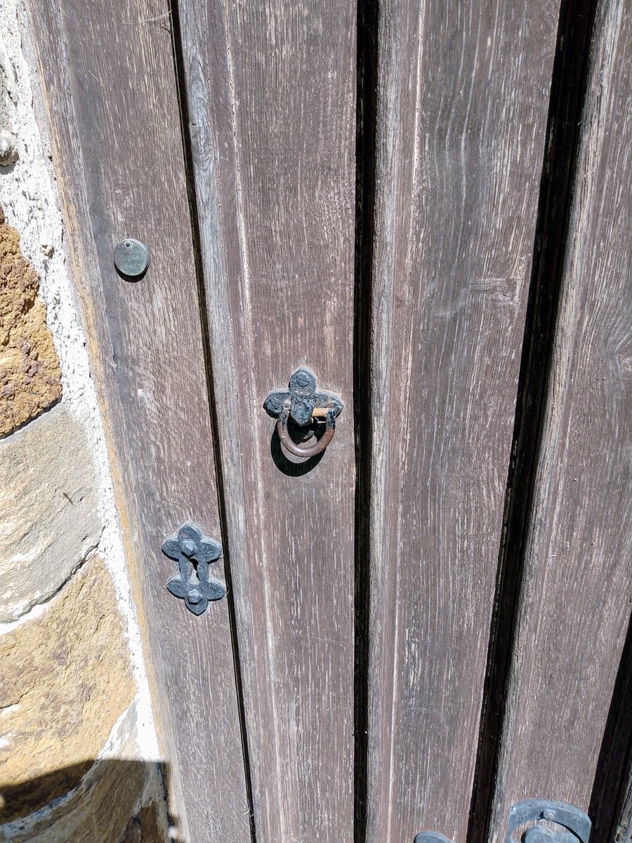 Southern Door details of #StMichaelAndAllAngelsFarndish in Spring #PhilOnaBike #DailyDoor #WoodenWednesday #AdoorableThursday