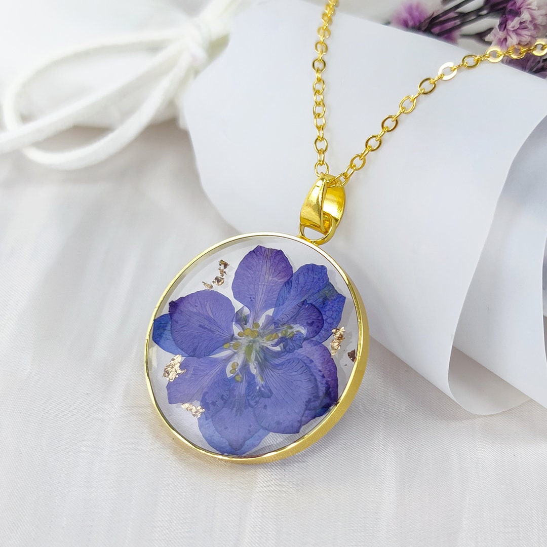 Birth flower Necklace of July | Larkspur Pressed Flowers | Handmade Dried Flowers For Resin | Best Friend Birthday Gifts 👇
#resinflowerjewelry #Atsknskrealflower #handmade #realflower #birthflower postdolphin.com/t/LMCSA