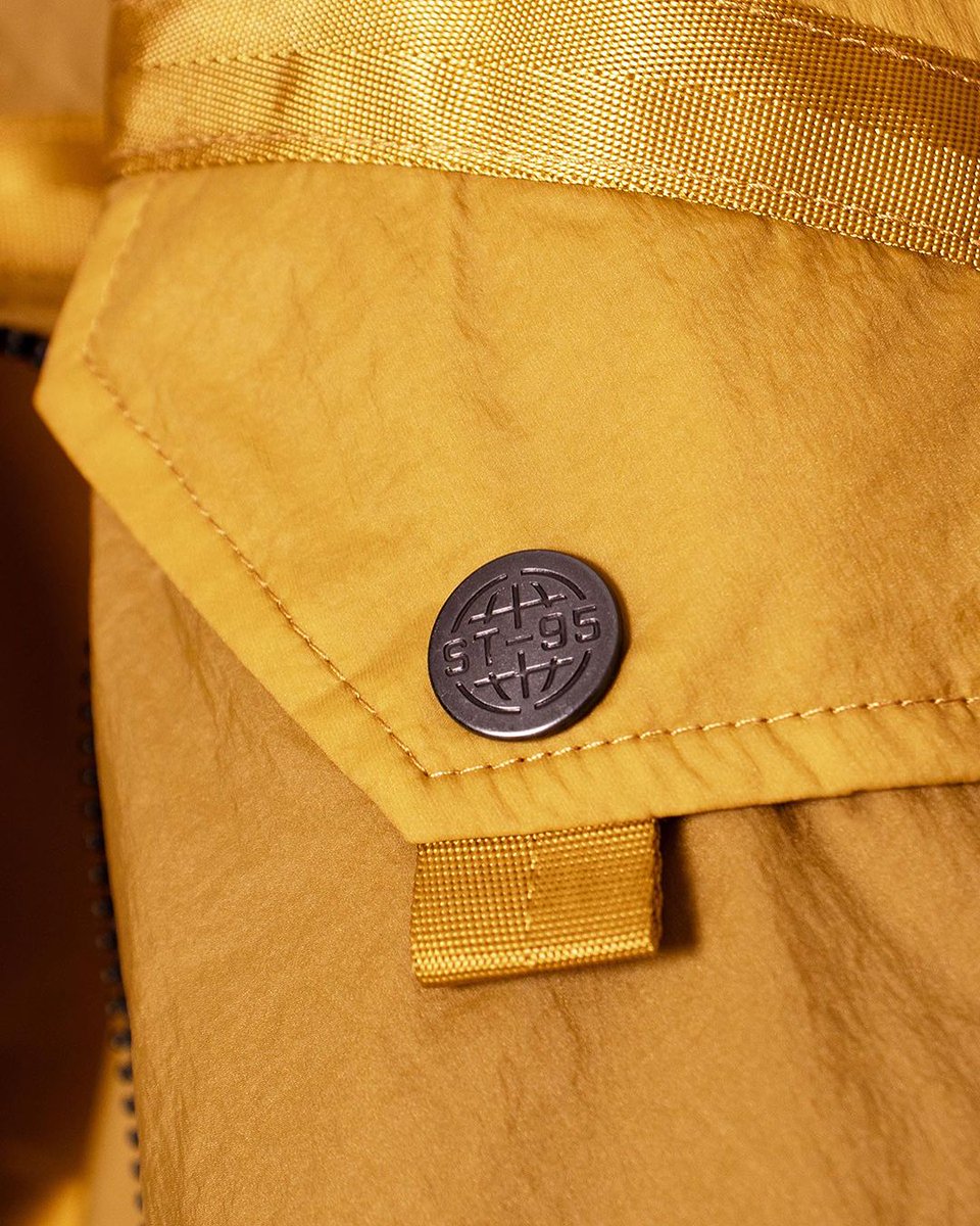 ST95 Helio Hooded jacket ultra-lightweight and translucent jacket, showing the layers within the garment, inspired by a very rare RAF issue life preserver waistcoat. #st95 #massimoosti #stninetyfive