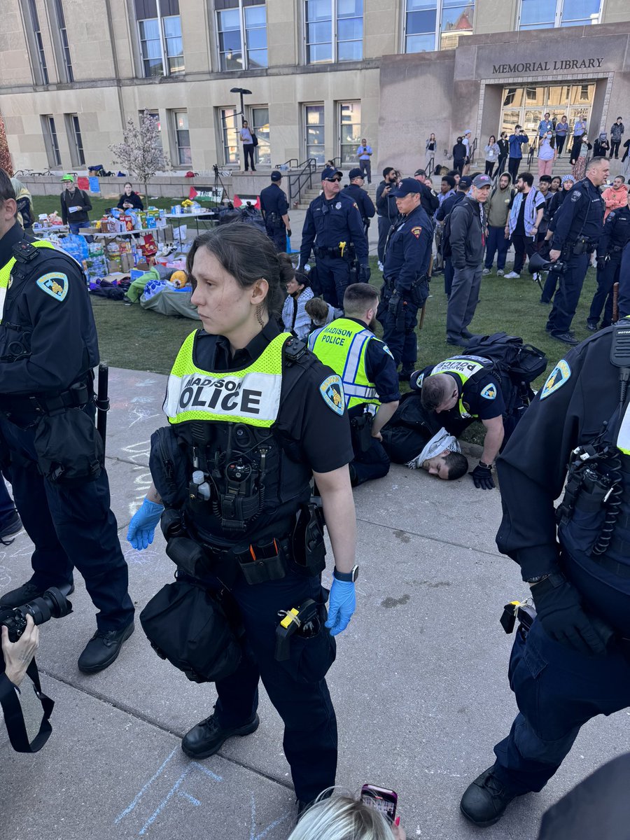 Police have protesters on the ground as they continue to take people into custody