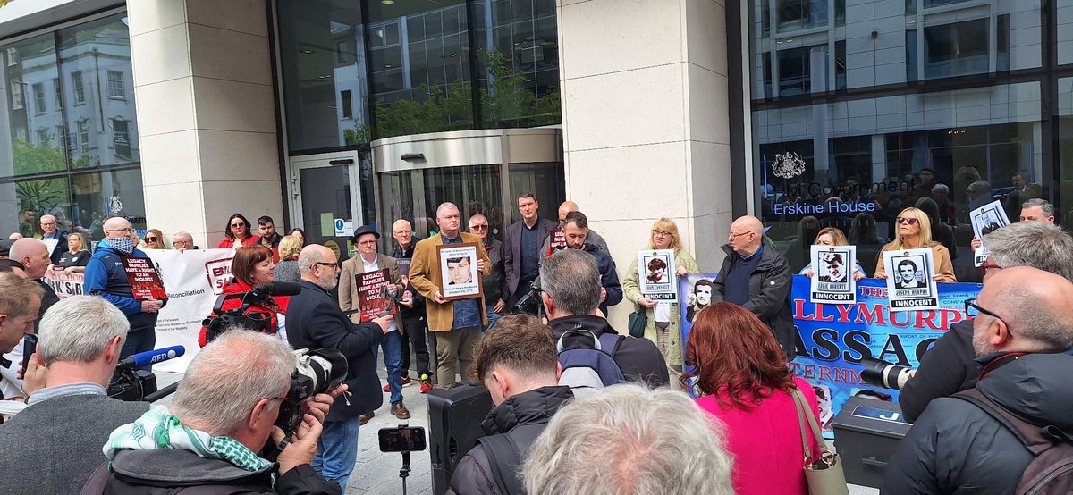 Damon Brown, grandson of murdered GAA man Sean Brown, and John Finucane, son of murdered lawyer Pat Finucane, speaking at the protest rally today outside @NIOgov against the Legacy Acr. Families are #NeverGivingUp