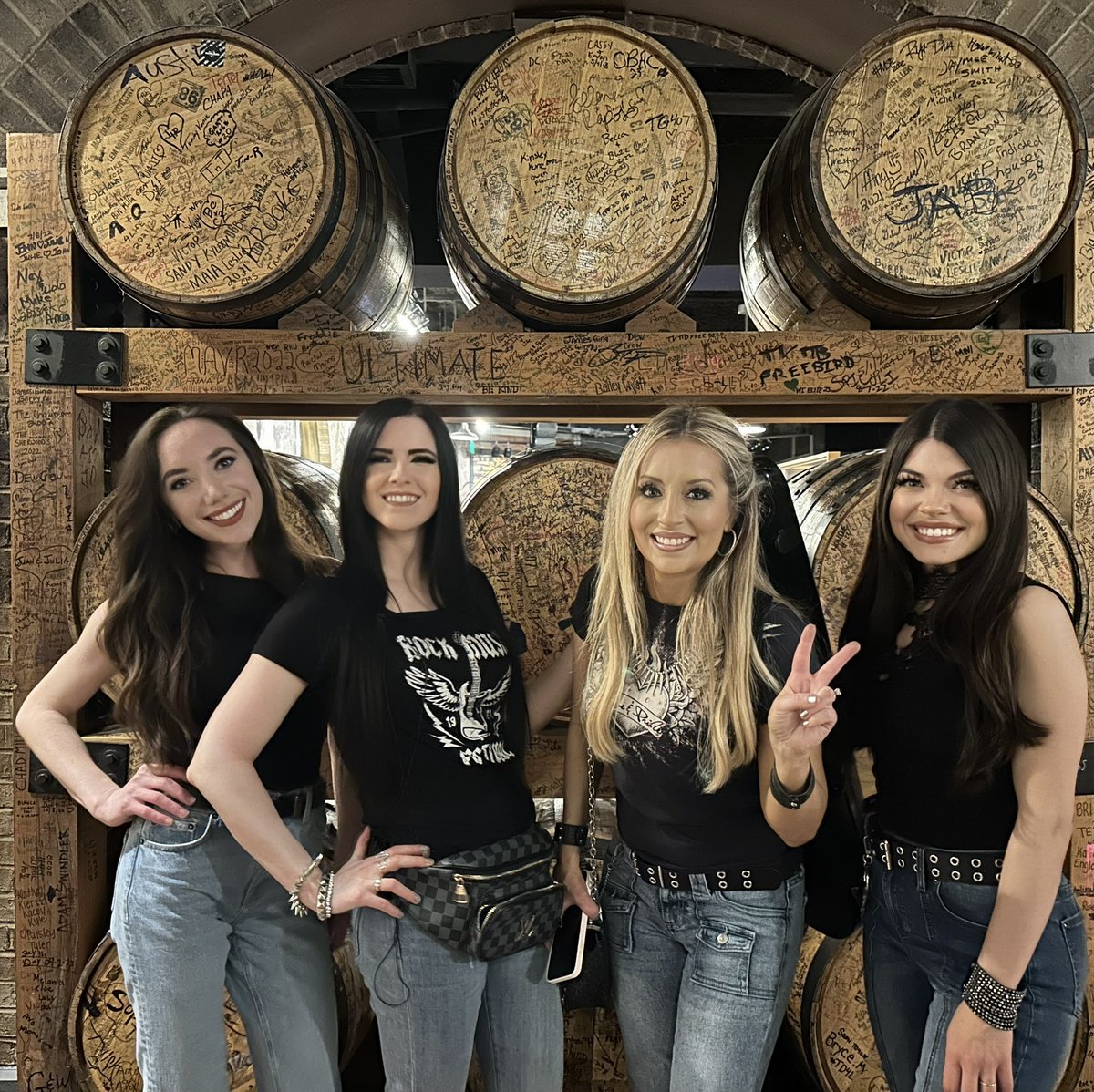 We kept the secret for a long time, but we were in Nashville because we were opening for Lynyrd Skynyrd for the private event @femmesofrock performed at!! Here we are in front of some barrels of Tennessee whiskey. 🥃