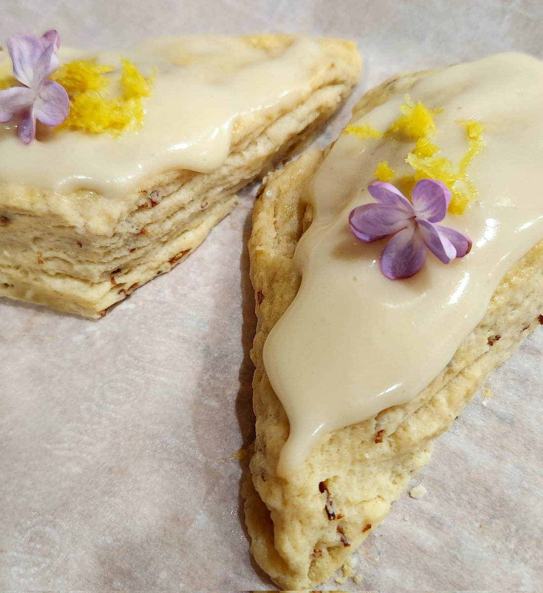 Good morning Tweeps (it's 11:56 here😜) Been a bit busy, making lilac scones with a lemon, cream cheese glaze this morning. *chef's kiss Have a great hump day y'all 😘