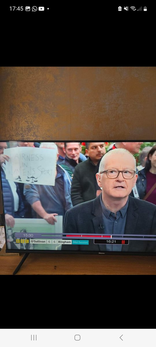 This is Michelle Browne holding a sign up at the snooker today. She was removed from the World Women's Snooker Social media accounts after playing 30 years. Myself,Jaime Parker & Mary Cunningham removed too. Security got involved. @sharrond62 @Riley_Gaines_ @ThePosieParker