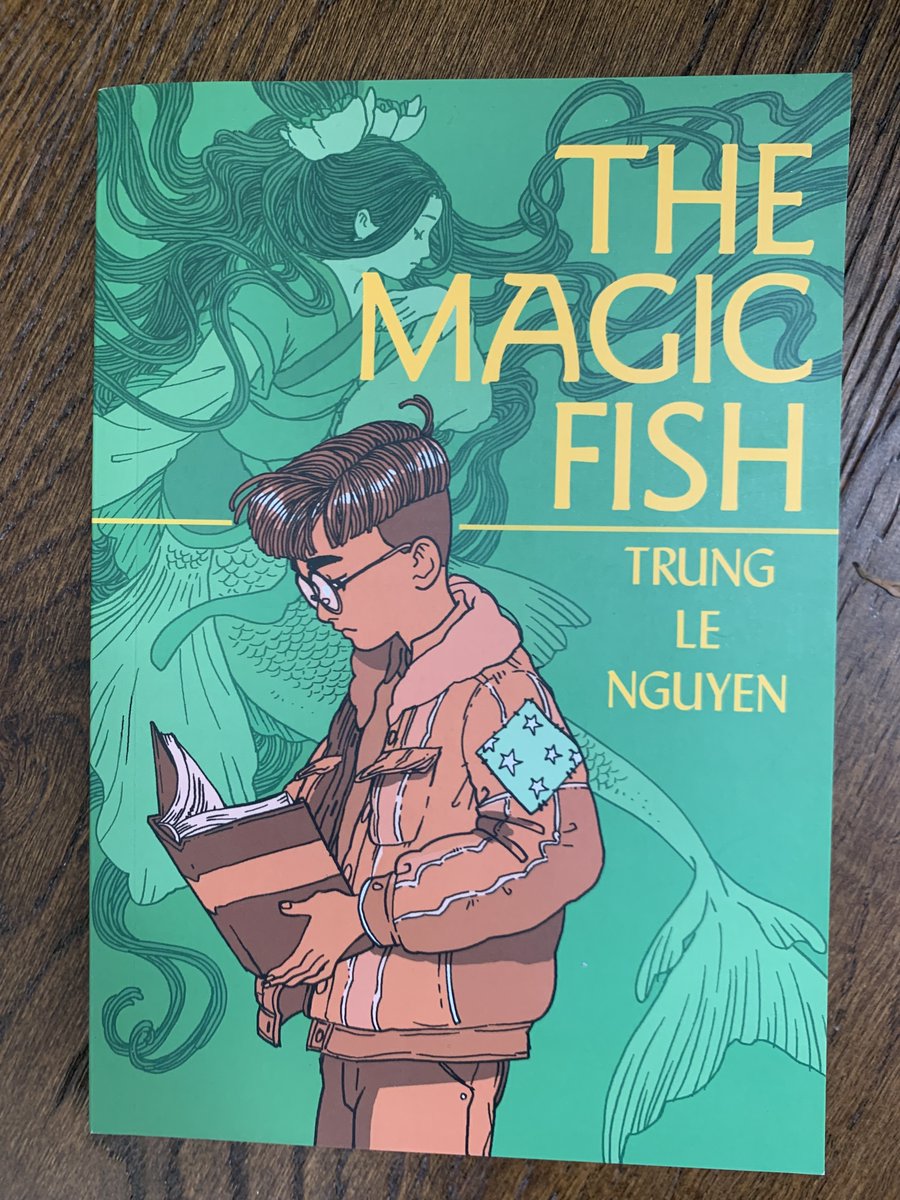 Still reading and loving contemporary merfolx lit #mermaidlit. Most recently, these two great &amp; very different novels: _Out of the Blue_ by <a href="/heyjasonjune/">Jason June (like Mary-Kate)</a> &amp; _The Magic Fish_ by <a href="/Trungles/">Trung Le Nguyen (not here anymore)</a>. Love. 
Now I just need to get to writing about them!