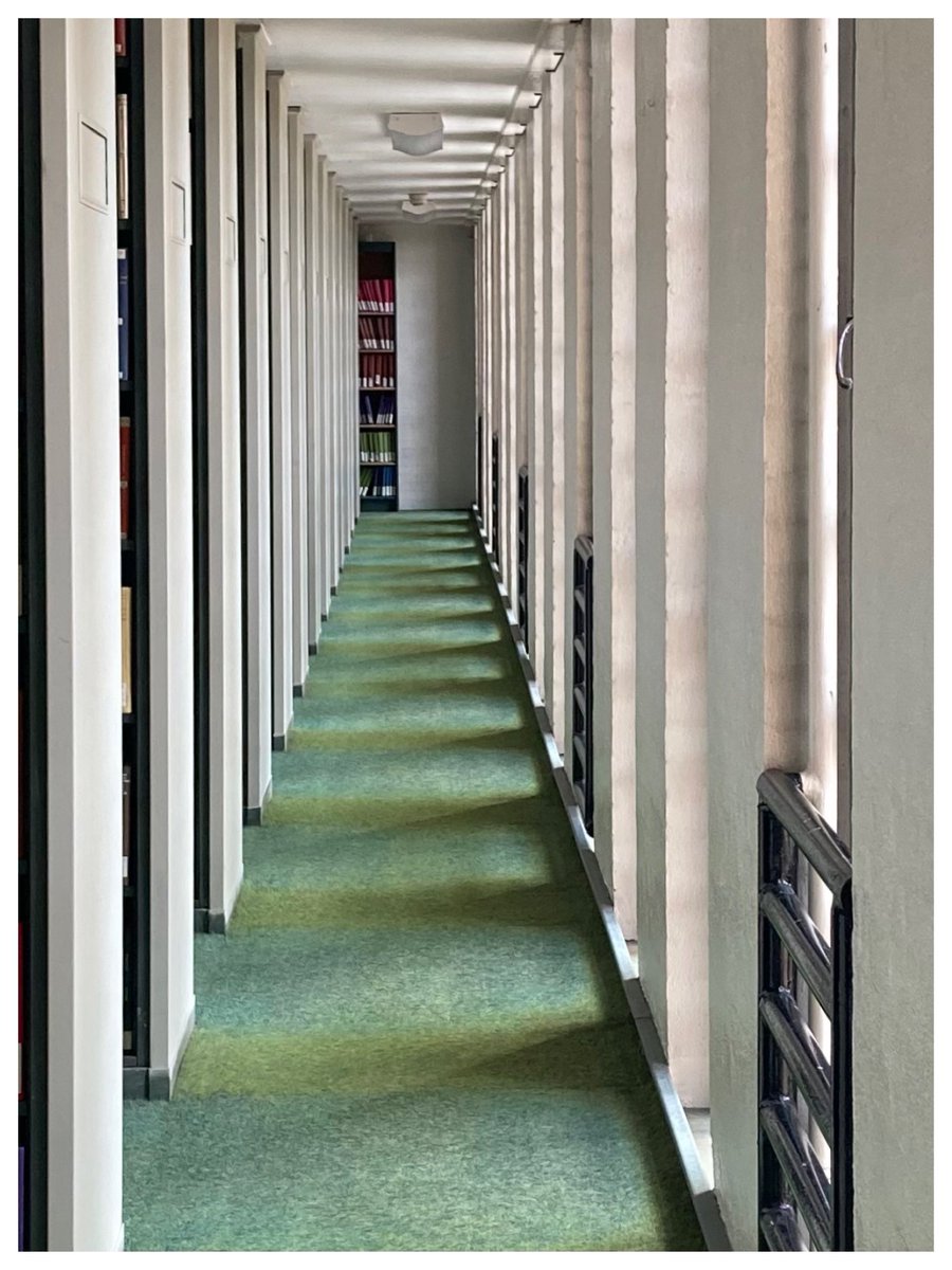 North Wing geometry, @theUL. Love the shadow triangles on the carpet from the morning light.