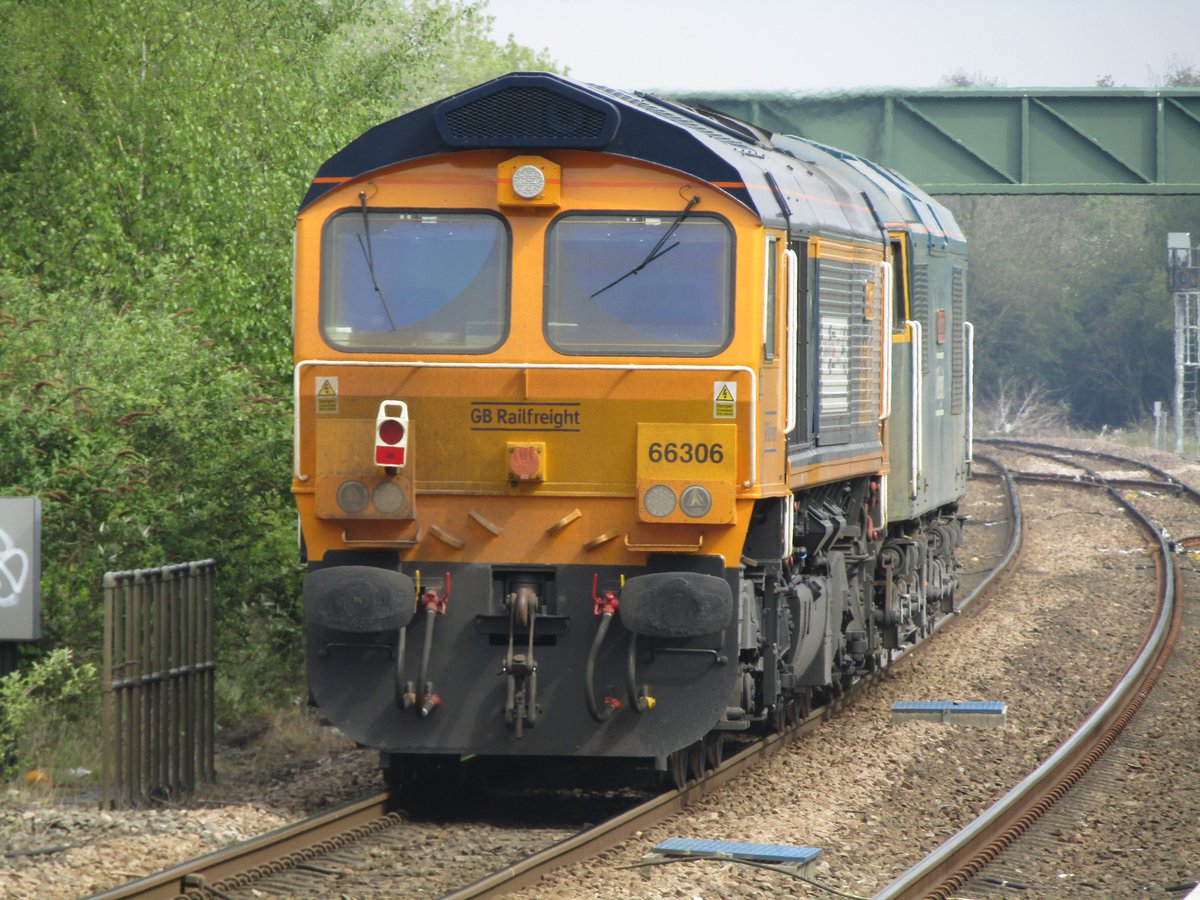 69007 & 66306 passing Spalding on 0D74 1055 Peterborough North Yd Gbrf to Doncaster Down Decoy Gbrf at 1059½ (15 minutes early).  Taken on 1 May 2024.