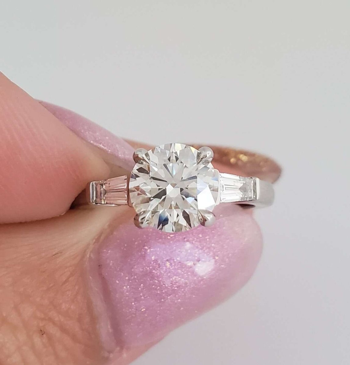 ✨ Our Classic Tapered Baguette features a stunning 1.255 F VS center diamond, flanked by two exquisite 0.15 ct F-G VS side stones. Perfectly crafted for moments that last forever. 💍 

#TimelessElegance #ClassicBeauty #BrianGavinDiamonds #MyBGD