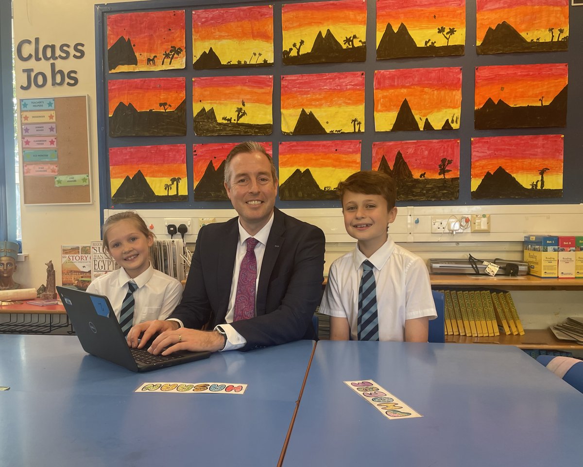 Education Minister @paulgivan visited @Grangepkps Bangor where he was greeted by Principal Michael Moore, Chair of the Board of Governors Drew Stitt, members of the school council and P3 pupil Poppy who wrote to the Minister inviting him to the school. During his visit the…