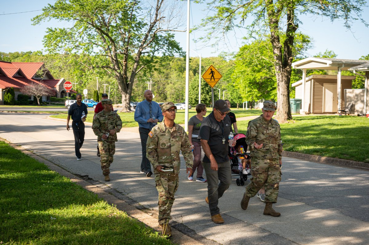 U.S. Army Garrison Fort Leonard Wood leaders, community members, Army Housing officials and representatives from Balfour Beatty Communities - Fort Leonard Wood's housing partner - make their way around the South Lieber Heights neighborhood April 30 during a walking town hall.