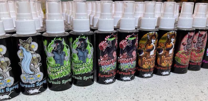 I just love how my fursuit spray labels featuring my own fursuiters have turned out. Thanks again @CausticCanine for all your hard work🥰 My fursuit sprays are now available full time in the 2oz size bottle with over 25 scents to pick from 🔗👇