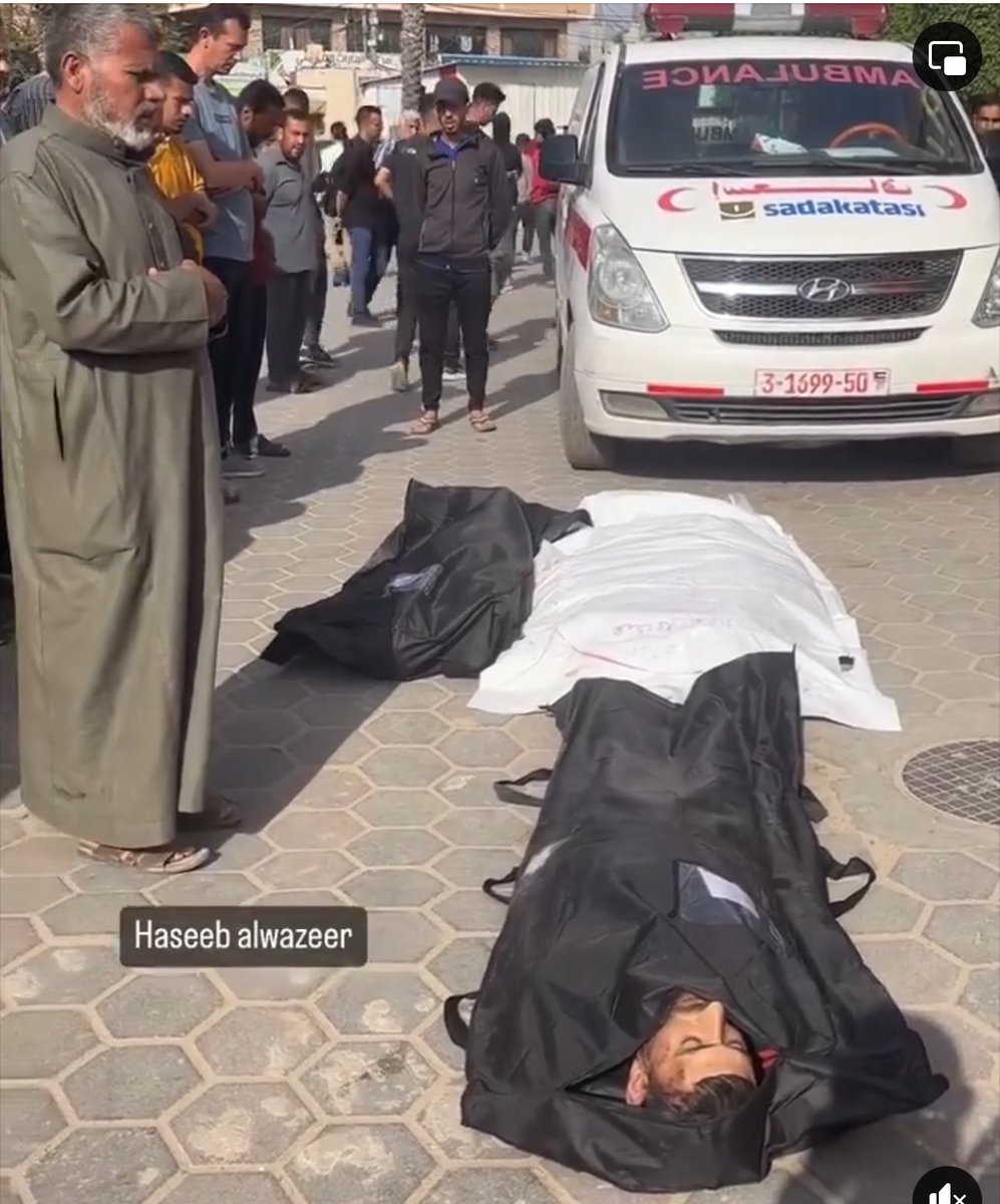 Palestinians perform funeral prayer for some of the victims of the Israeli genocide in Gaza at Al-Aqsa Martyrs Hospital in Deir el-Balah, this morning.