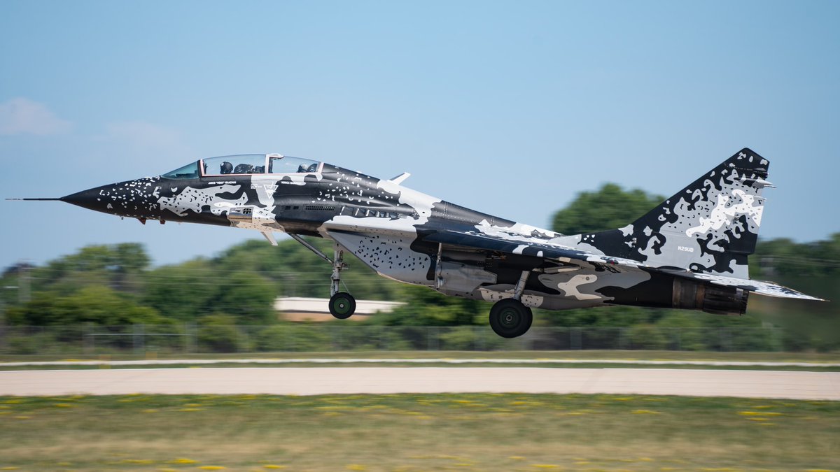 Mikoyan MiG-29UB Fulcrum taking off during the EAA AirVenture 2023 airshow, a one of its kind aircraft.