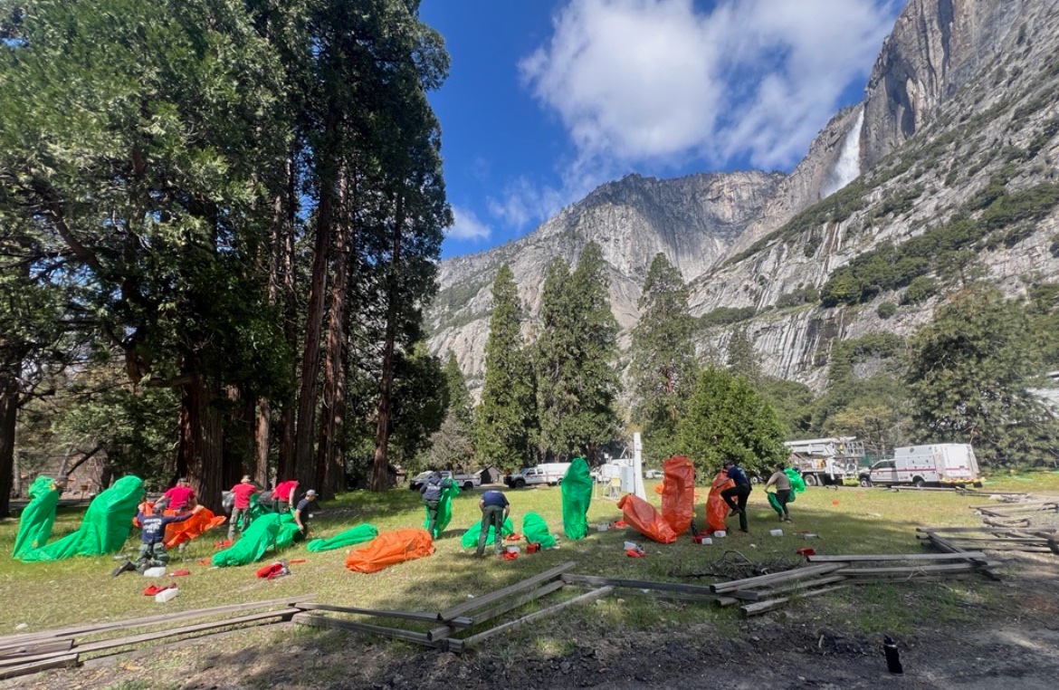 Part of the annual fire refresher includes a fire shelter deployment. Practice shelters are utilized during this training as real fire shelters are made of fire resistant material. NPS photo/R.Mitchell #firefighter #training