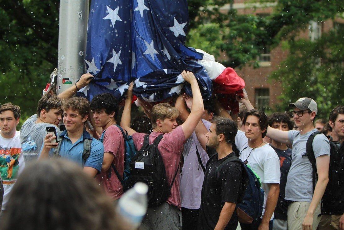 Yesterday, pro-Hamas protesters took down the American flag and hoisted up the Palestinian flag instead. While the pro-Hamas protesters tried to remove & destroy the US flag, these fraternity brothers protected it while getting pelted by protestors.