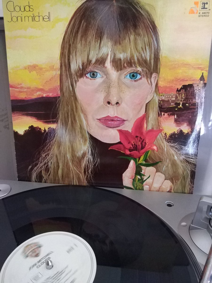 A prairie lily in a young girl's hands. Essential classic. 
#OnThisDay 1️⃣9️⃣6️⃣9️⃣ exceptional #singersongwriter @jonimitchell released her 2nd album Clouds.
#JoniMitchell #60smusic #anniversary #60s
