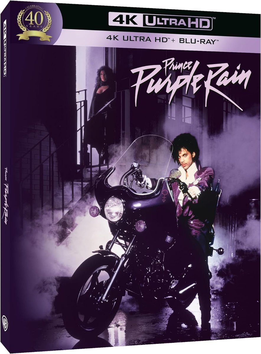 ***ANNOUNCEMENT***

Coming on July 29th in the UK on #4K #Steelbook and standard releases from @wbpictures: #PurpleRain (1984)!

Winner of Grammy® and Academy Awards®* for its pulsating song score, Purple Rain marks the electrifying movie debut of Prince as The Kid,
