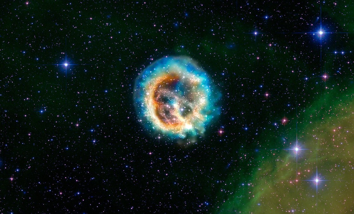 Today Chandra is studying supernova remnant E0102, the debris of a very massive star that exploded over 1,000 years ago. In this composite image, X-rays detected by Chandra are orange, cyan, and blue & optical light from @NASAHubble is red, green, and blue. (1/2)