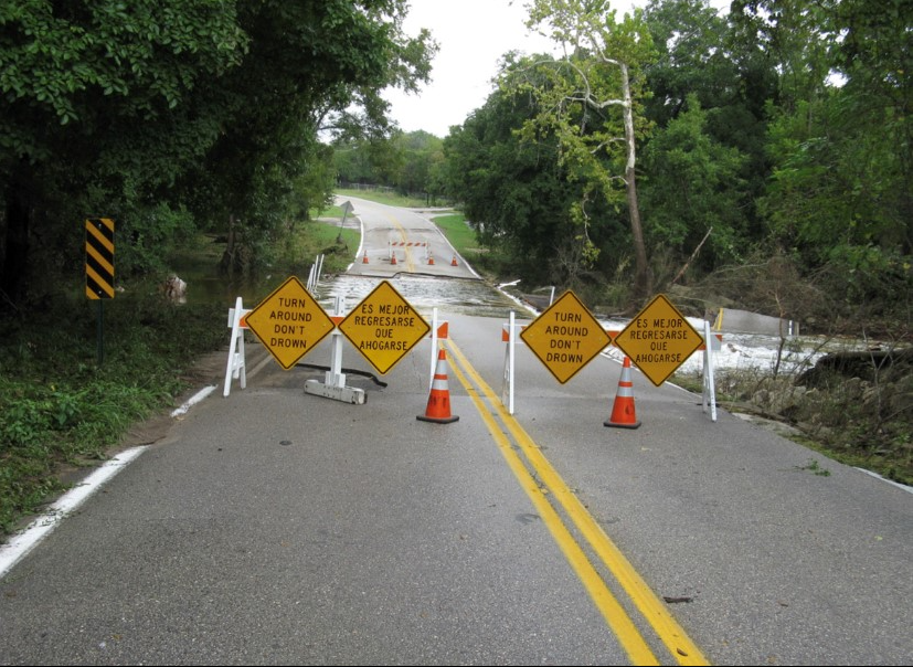Rain could cause flooding at some low water crossings. Check for road closures at ATXFloods.com or follow @ATXfloods. Anytime you see water flowing over a road, find another route. Never drive around barricades at low water crossings. #TurnAroundDontDrown