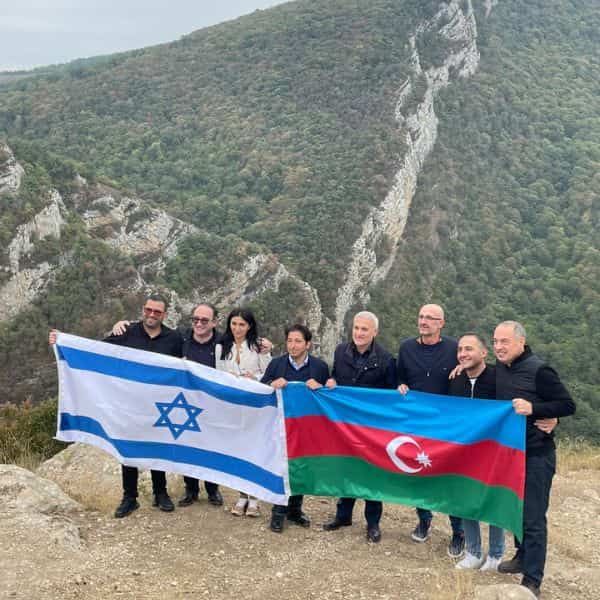 Anyway here's a photo of Israeli and Azeri businessmen in the ethnically cleansed city of Shushi where they were planning the economic development of Azeri settlements in Nagorno-Karabakh