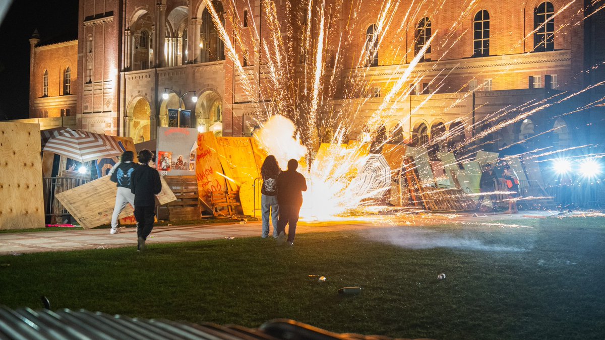 Photos from tonight’s assault on the Gaza Support camp on the UCLA campus. The Israel supporters used mortar fireworks to lay siege on the Occupation.