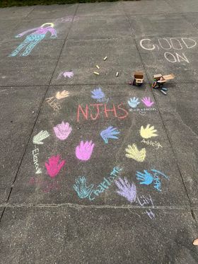 NJHS decorated our bus loop sidewalks yesterday with encouraging messages for our 8th graders taking SOLs today! #onecrew #oneccps