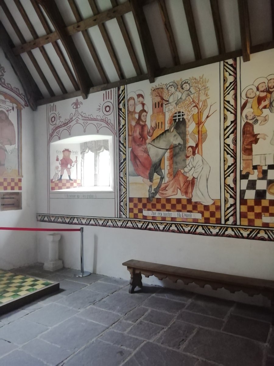 Church at Saint Fagan's with wall decorations restored to c1530 before the Reformation swept them away