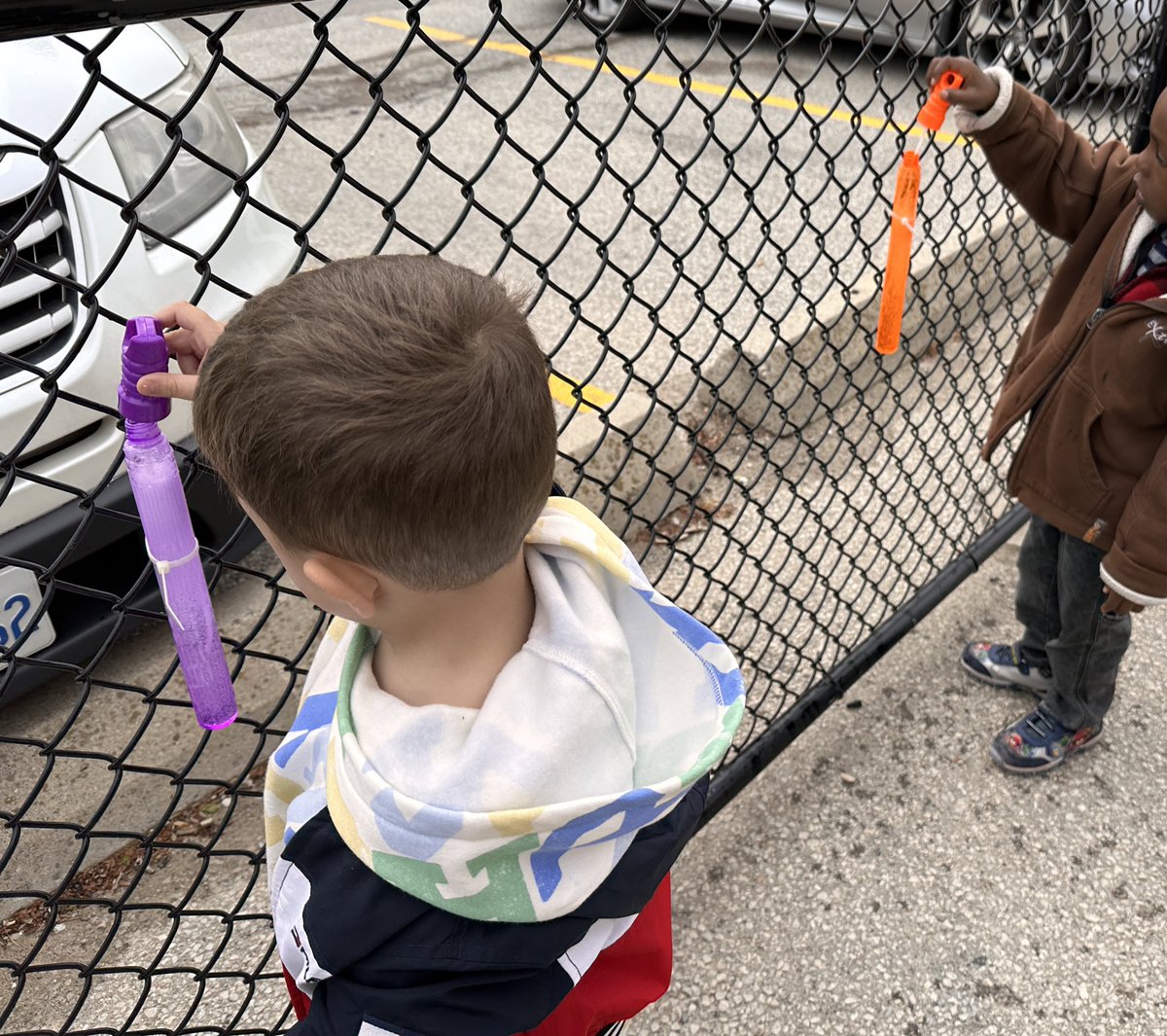 Bubble time!! #bubbles 
Snug to the fence.  Let's hope we have less spills this way!! 🤞#Kindergarten #GetOutside