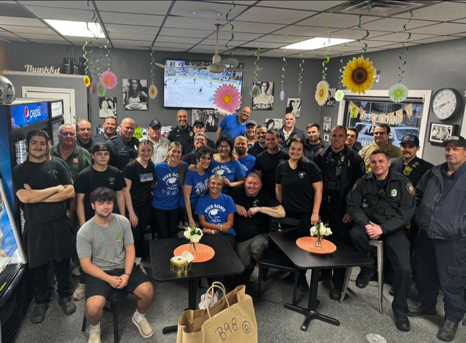 Some of the Hamilton and Wenham Public Safety delivery drivers with Staff from Five Son's Pizza