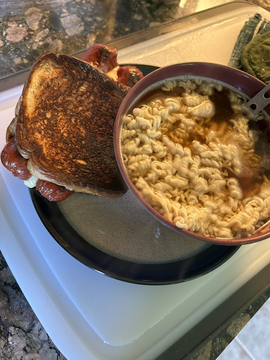 Our of stuff for lunch so had to get creative ramen and a glizzy grilled cheese. 7/10 for creativity and adaptability. 

#hotdog #grilledcheese #adaptive