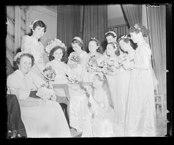Happy May Day! 🌱 Spring has finally sprung and people across the UK have been celebrating with traditions that date back hundreds of years. This photo from 1955 shows Margret Russ from south Reading being crowned May Queen - flower crown and all! 🌸 Object number: 1980.36.C52.2