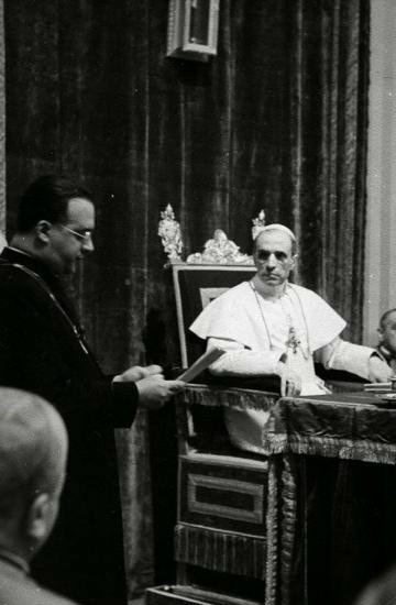 Fr. Georges Lemaître explaining his new 'Big Bang theory' to Venerable Pope Pius XII c. 1951.