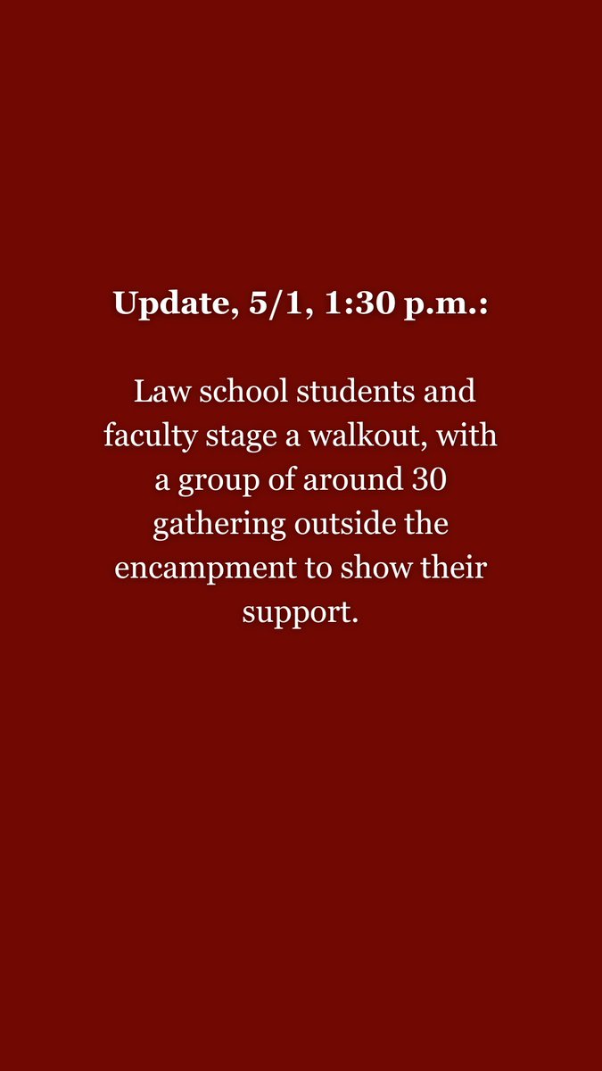 Update, 5/1, 1:30 p.m.: Law school students and faculty stage a walkout, with a group of around 30 gathering outside the encampment to show their support.
