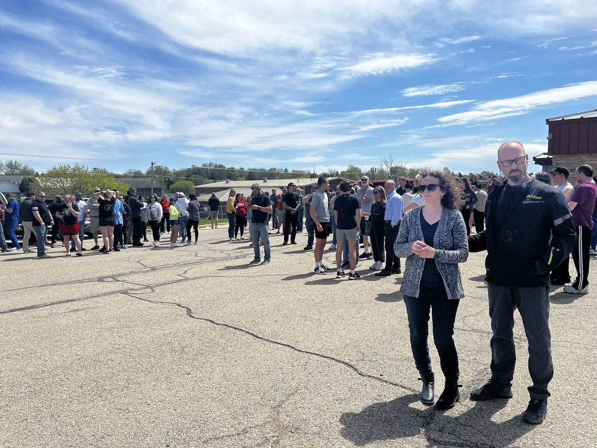 Parents at the Mt Horeb School District Bus Garage awaiting reunification with students. We are told students from the high school, middle school and intermediate center will be bused here but we don’t know when.