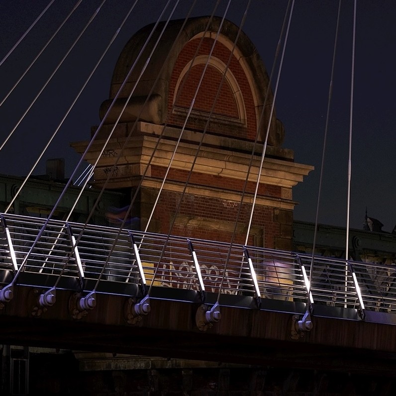 These before and after photos reveal the subtle yet profound impact of #IlluminatedRiver on the Golden Jubilee Footbridges. The monochromatic lighting enhances the suspended pedestrian walkways, accentuating their sleek and modern style. @VillarealStudio