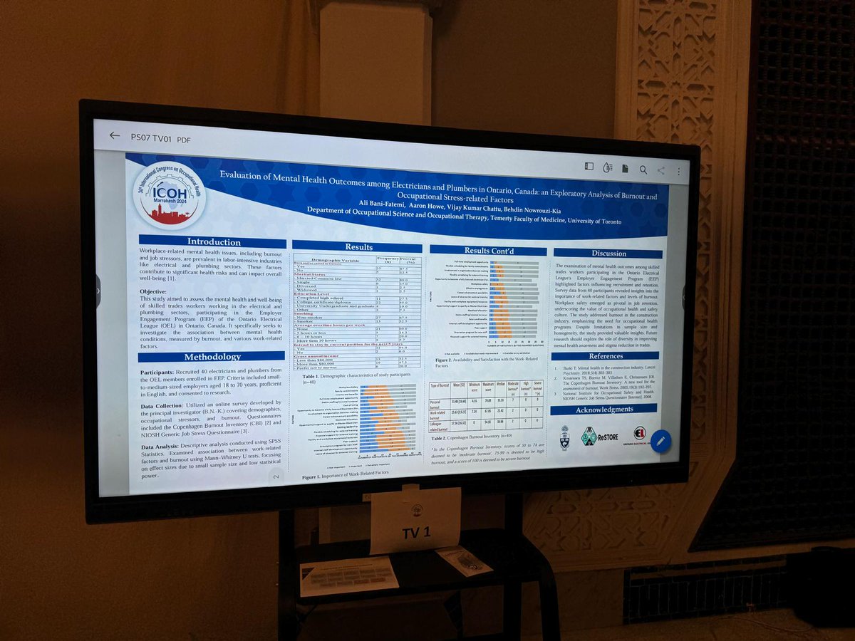 Standing proud in front of our abstract on mental health among Ontario's electricians & plumbers, crafted by @FatemiBani, @vkchattu, and @behdin at the 34th ICOH Conference in Marrakesh! 🌍🔍 Supported by @OELeague. #ICOHConference #OccupationalHealth #MentalHealthResearch