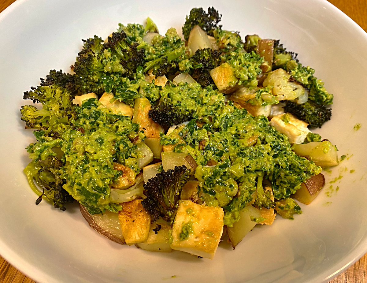 Roasted broccoli, cauliflower, potatoes, and tofu, topped with a homemade kale walnut pesto. 😋 #whatveganseat #veganfood