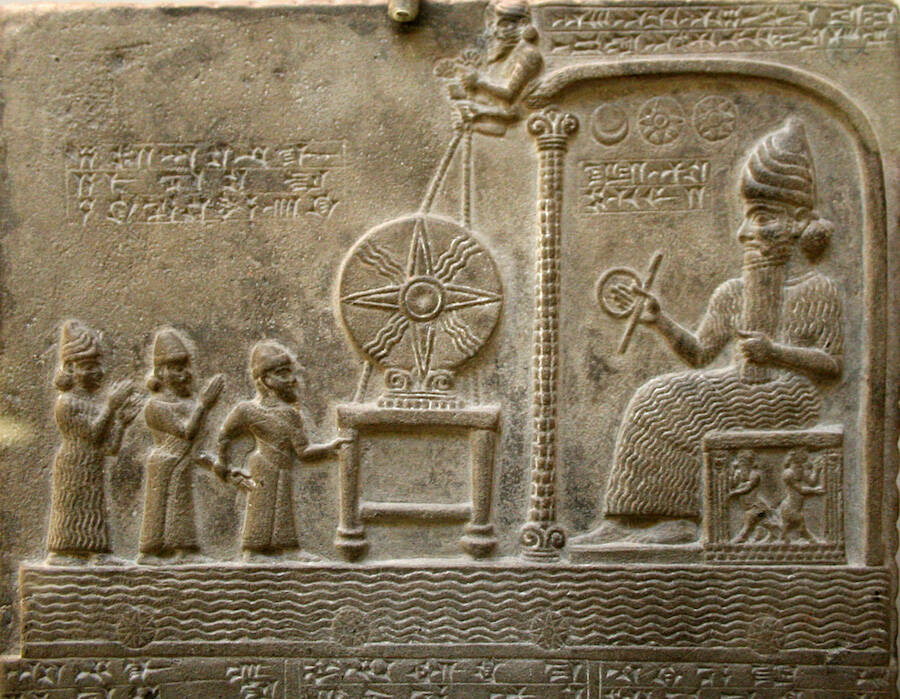 A carving depicting the Anunnaki, the ancient Sumerian gods. Find it interesting that the being on the right is placed in some kind of control room while sitting on a Box (Cube thing?)... A lot to unpack on this carving. What do you see?