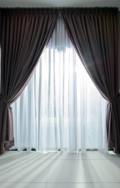 Consider layering different types of window treatments for both functionality and aesthetic depth. Combining sheer shades with heavy draperies can allow for adjustable light control while adding a rich, textured look to your interiors. #tipoftheday