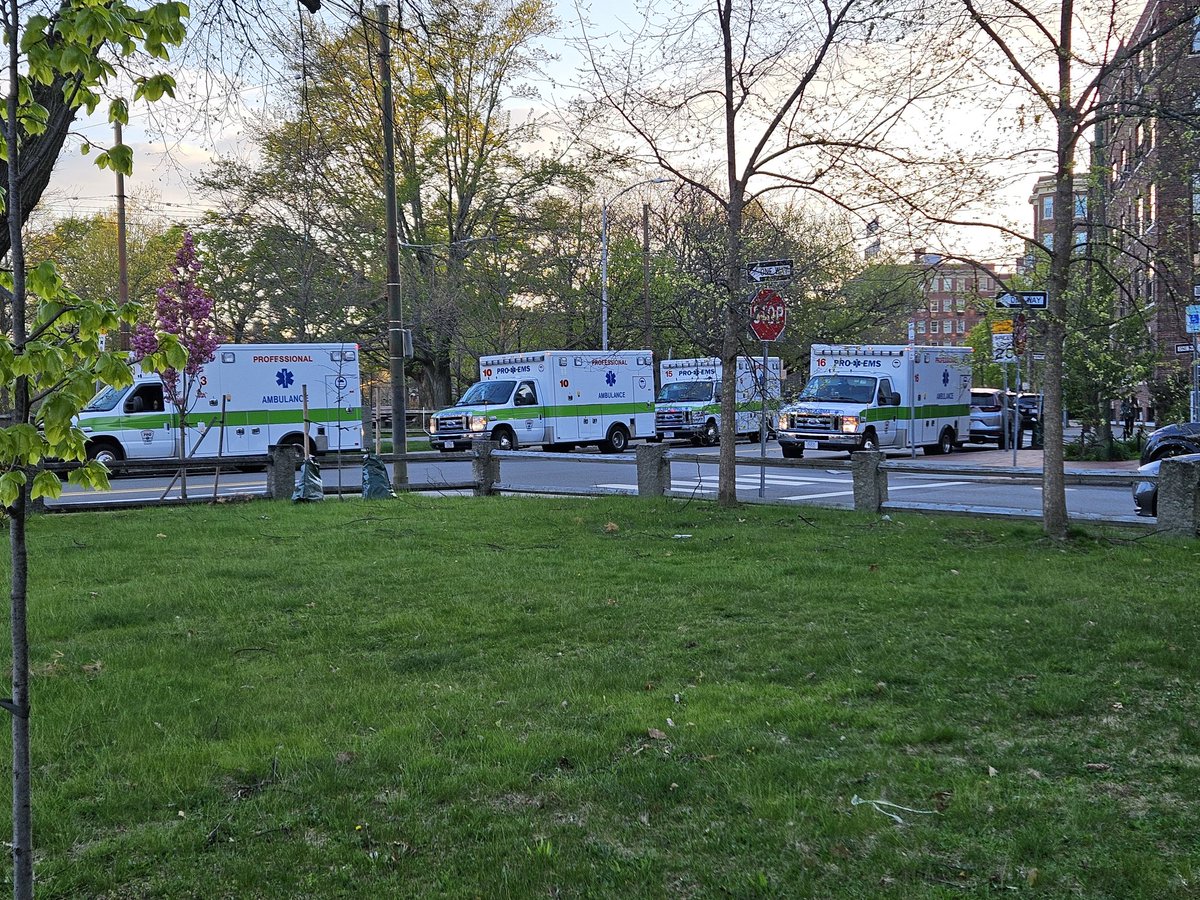 Five ambulances staged next to Cambridge Common (one just pulled away). I wonder what they're waiting for...