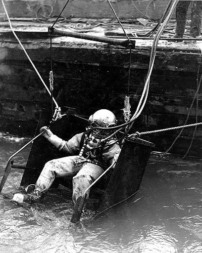 Diver entering water, Grand Coulee Dam construction site, 1938