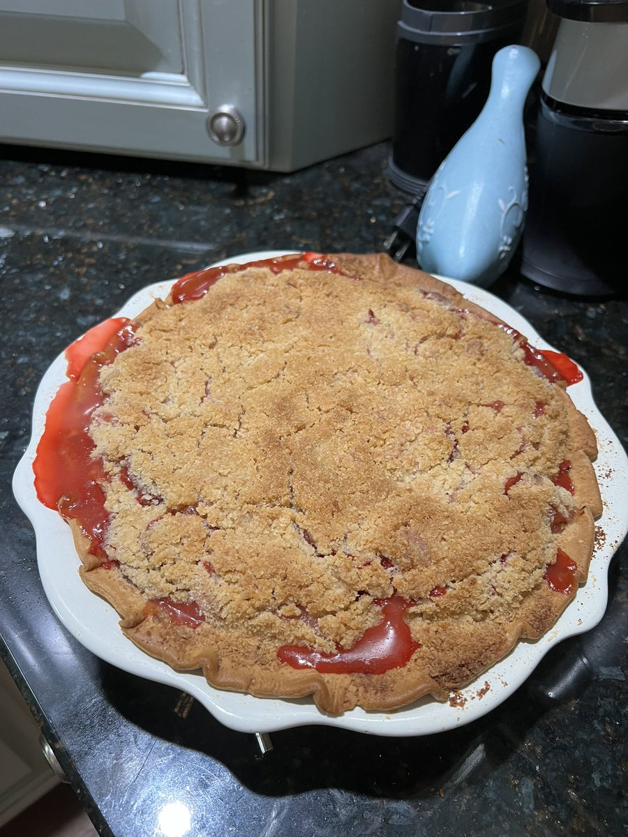 Felt cute, made a streusel topped strawberry-rhubarb pie, might devour later.