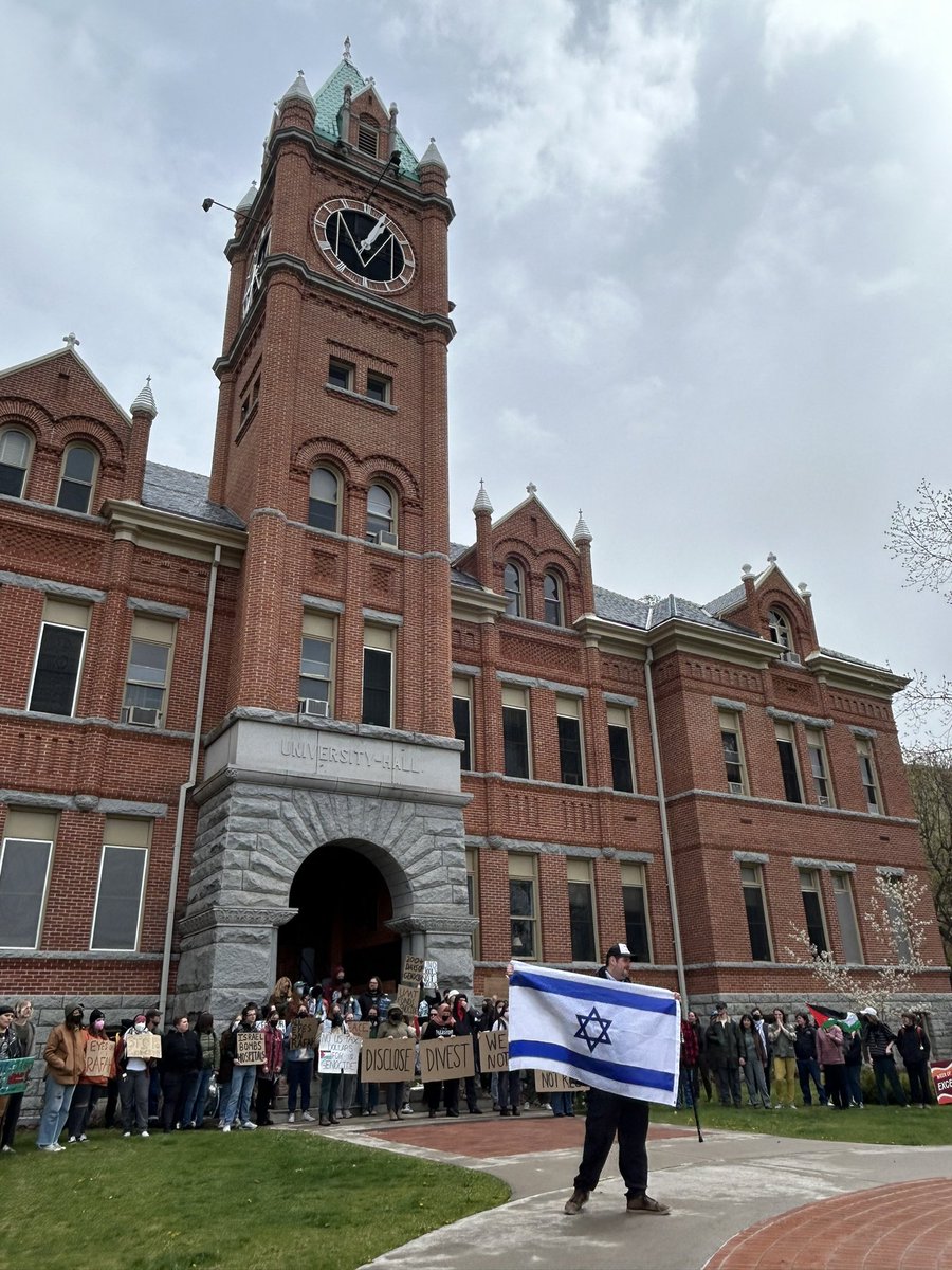 Strike for Gaza protest just started at @umontana— one counter protester just showed up with Israeli flag. Some charged words exchanged but peaceful so far. #mtnews