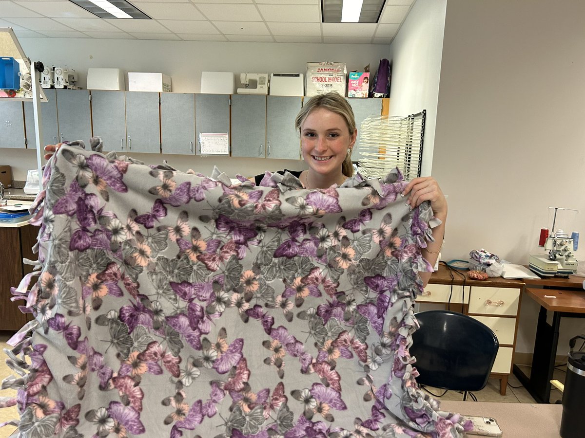 Students gather to make blankets for Light of Life.