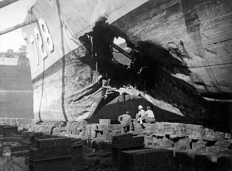 The U.S. Navy destroyer USS Mansfield (DD-728) drydocked at Sasebo, Japan, after striking a mine near Wonsan, Korea, on 30 September 1950. 

The ship received a temporary bow before steaming to the Puget Sound Navals Shipyard, Washington (USA), for permanent repairs.