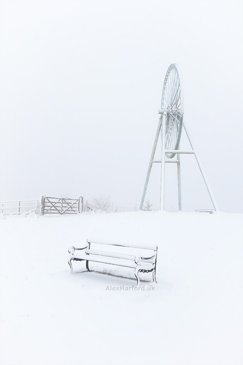 On #StaffordshireDay, here's one of my favourite photos taken in my home county, of the pit wheel memorial at a snowy and misty Apedale Country Park.

#EnjoyStaffs #SnowScene #MiningHeritage