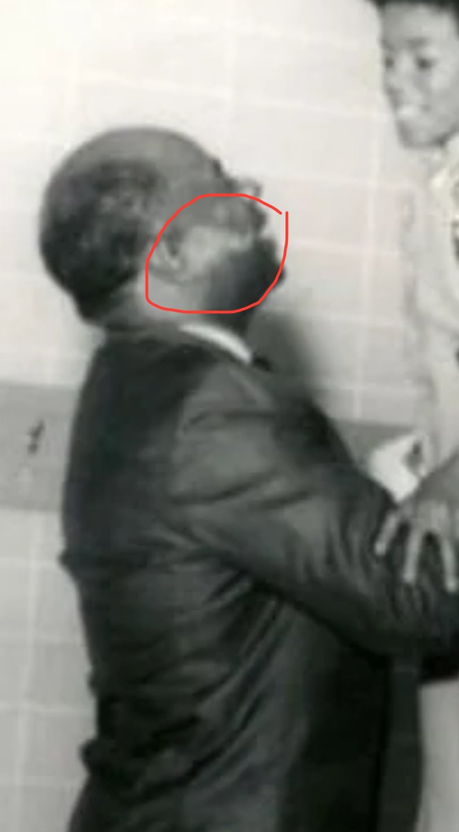 went on a deep dive and here’s a rare picture of michael’s grandfather (joe jackson’s dad) with michael and his vitiligo